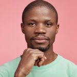 closeup portrait young african american man - Nexuraweb